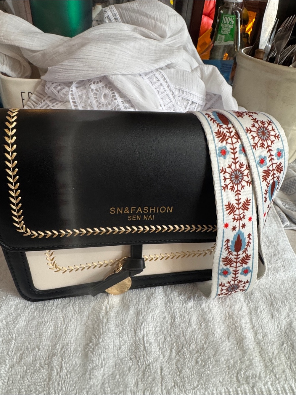 Two-Tone Black and Cream Crossbody Bag with Embroidered Strap